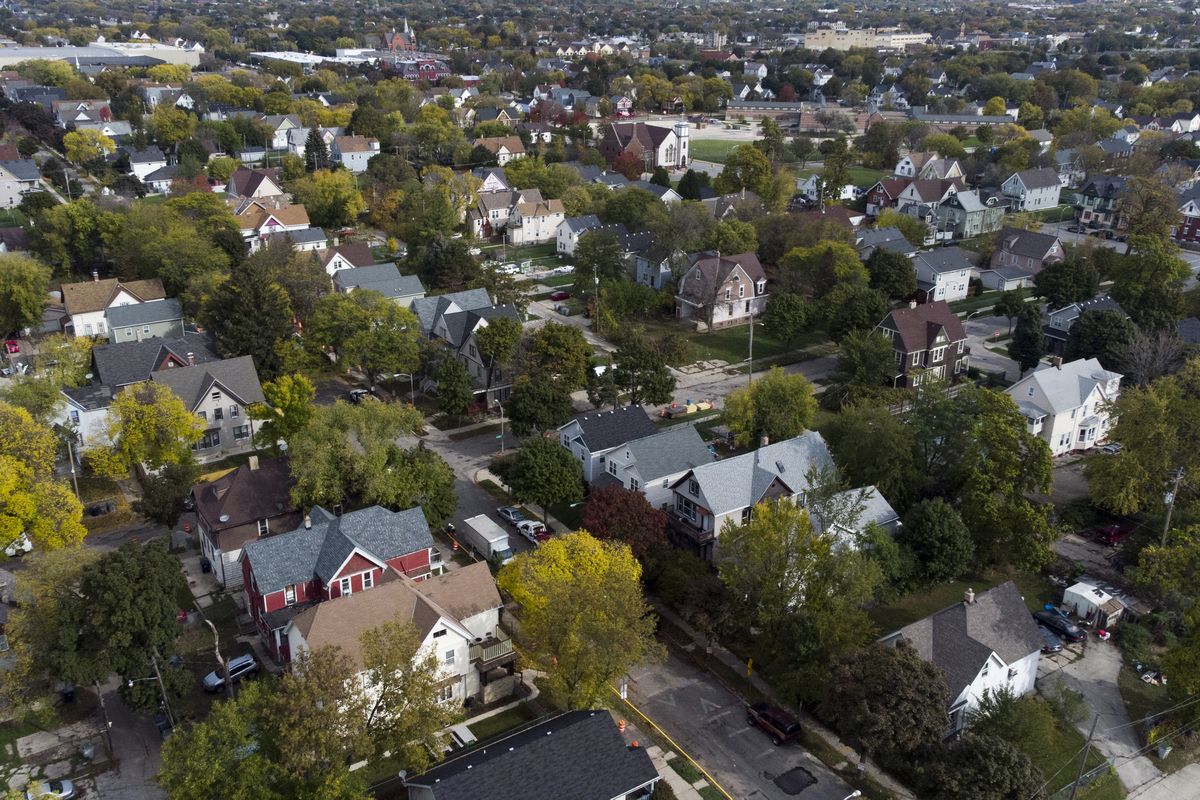 This Friday, Oct. 22, 2021 photo shows a neighborhood in Milwaukee that is one of many places in the country where a new method used by the U.S. Census Bureau to protect confidentiality in the 2020 census has made people and occupied homes vanish — at least on paper — when they actually exist in the real world.  (Morry Gash)