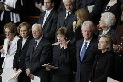 
Surrounded by former first ladies and presidents, first lady Laura Bush, center, wipes her eye during a funeral service Saturday for former first lady Lady Bird Johnson in Austin, Texas. Associated Press
 (Associated Press / The Spokesman-Review)