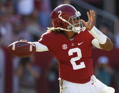 In this Oct. 22, 2016, file photo, Alabama quarterback Jalen Hurts sets back to pass during the first half of an NCAA college football game against Texas A&M, in Tuscaloosa, Ala. Hurts is trying to become only the second true freshman quarterback to lead a major college team to a national title. (Brynn Anderson / Associated Press)