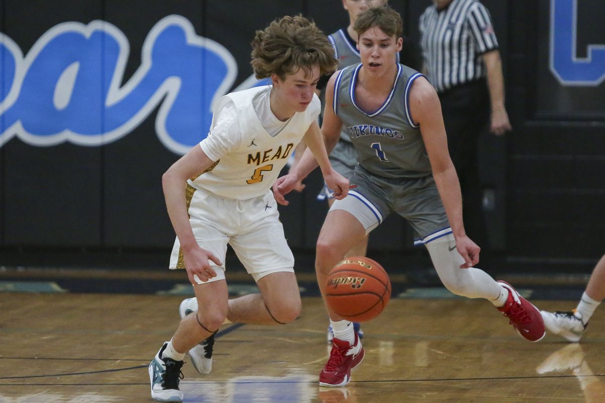 Mead guard Brady Thornton starts a fast break during the Central Valley Holiday Tournament on Thursday. Mead won 65-60.  (Cheryl Nichols/For The Spokesman-Review)