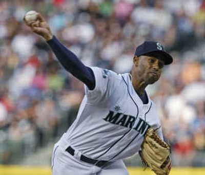 Starting pitcher Miguel Batista delivers to the Toronto Blue Jays during the third inning of Saturday's seventh consecutive M's win.
(Associated Press / The Spokesman-Review)