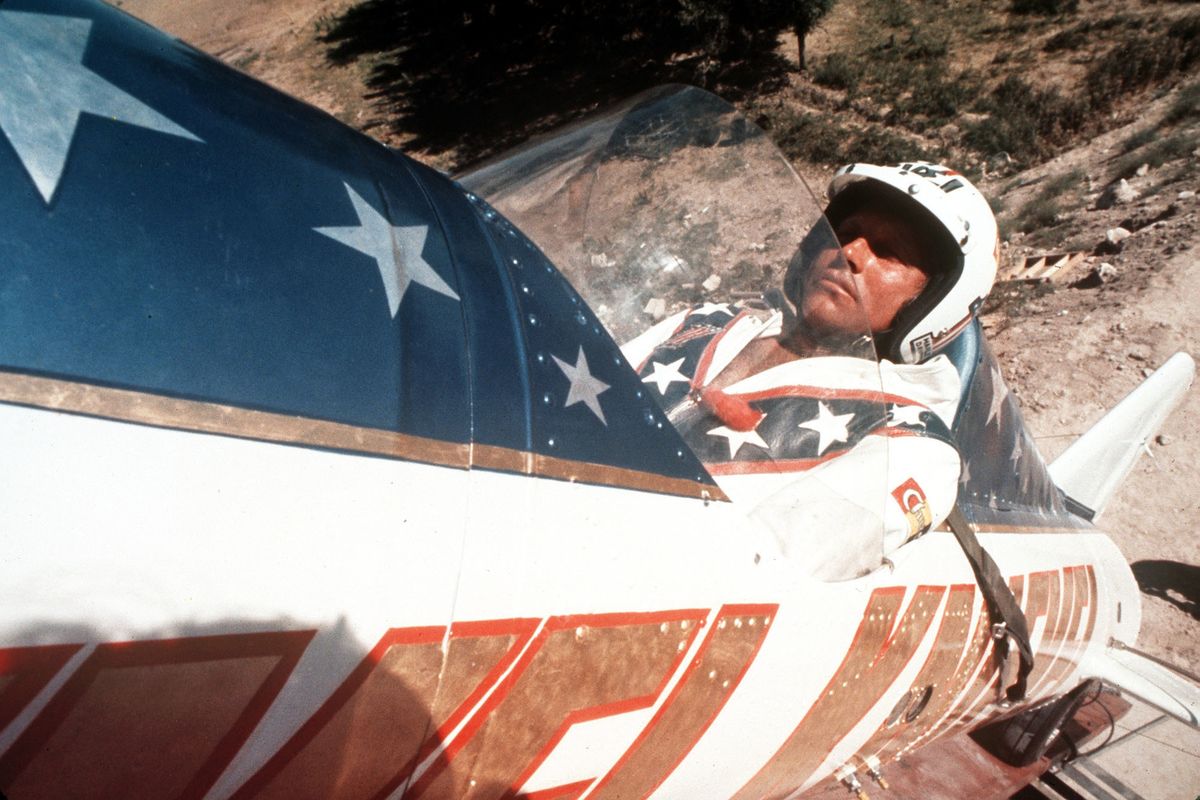 Evel Knievel sits in the steam-powered rocket motorcycle that would attempt to take him across Snake River Canyon in Twin Falls, Idaho, on Sept. 8, 1974.  (Anonymous)