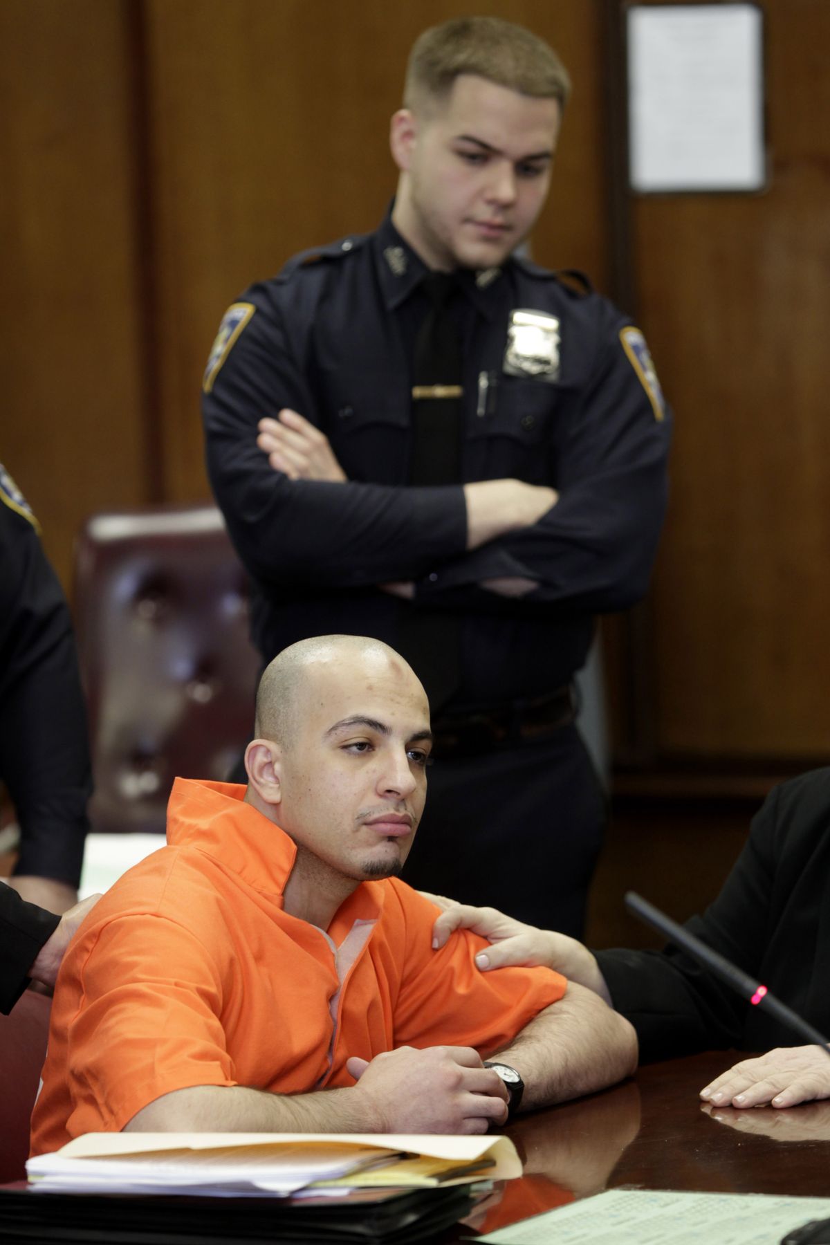 FILE- In this March 13, 2012 file photo, Ahmed Ferhani appears in a New York City courtroom on state level terrorism charges. On Tuesday, Dec. 4, 2012, Ferhani pleaded guilty to charges that that he plotted to blow up city synagogues, saying he had wanted to �send a message of intimidation� to the city's Jewish community. (Seth Wenig / Associated Press)