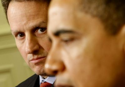 Treasury Secretary Timothy Geithner listens to President Barack Obama speak during their meeting Wednesday in the Oval Office of the White House.  (Associated Press / The Spokesman-Review)