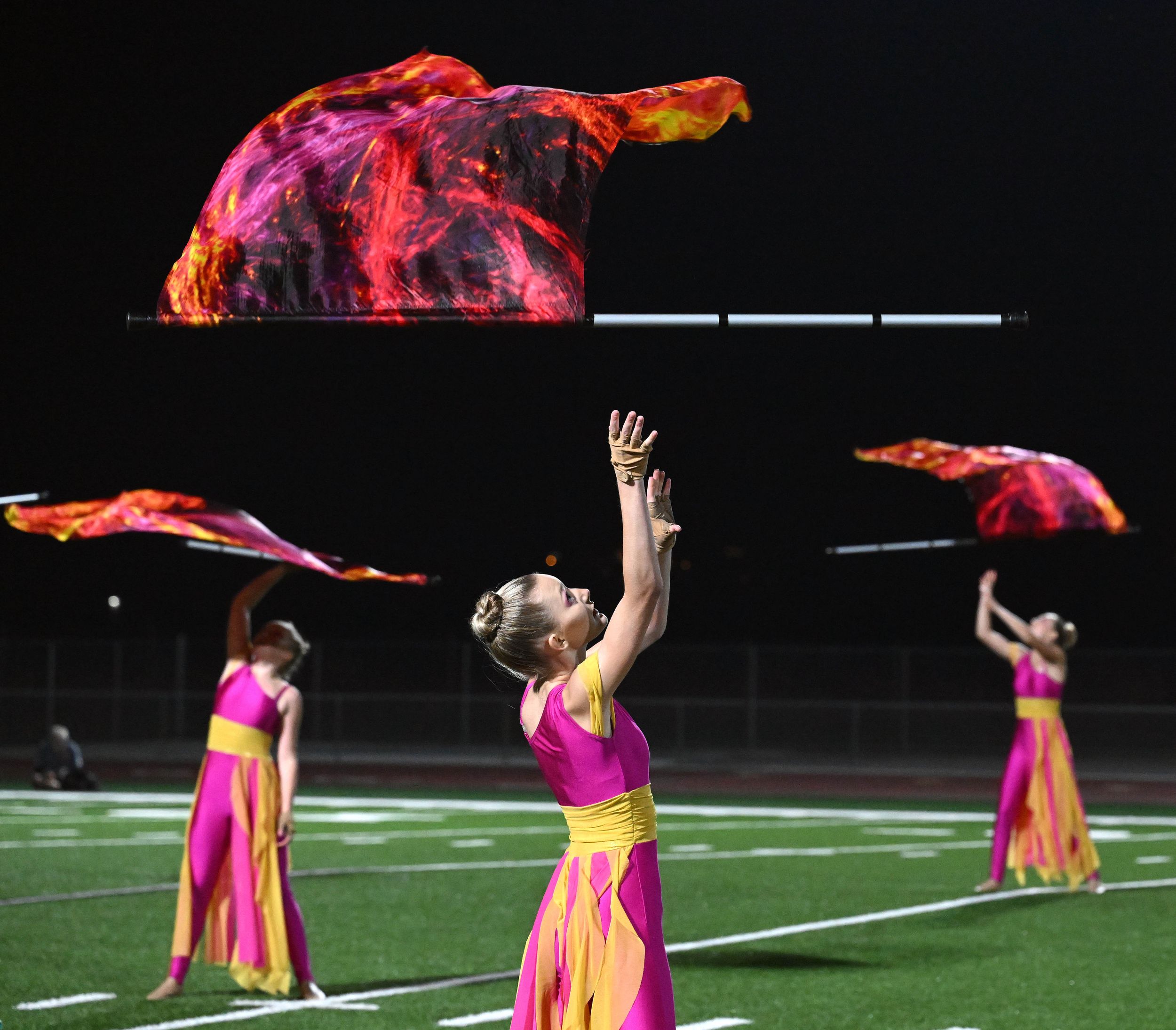 Color guard adds 'visual attribute' to marching band – The Red Ledger