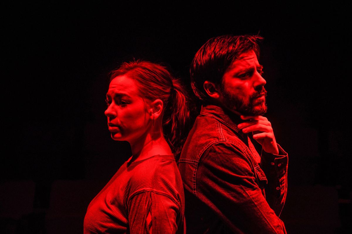 Chelsea DuVall, as Marianne, and Max Elinsky, as Roland, in the “Red Light” scene of Spokane Civic Theater’s “Constellations.” (Dan Pelle / The Spokesman-Review)