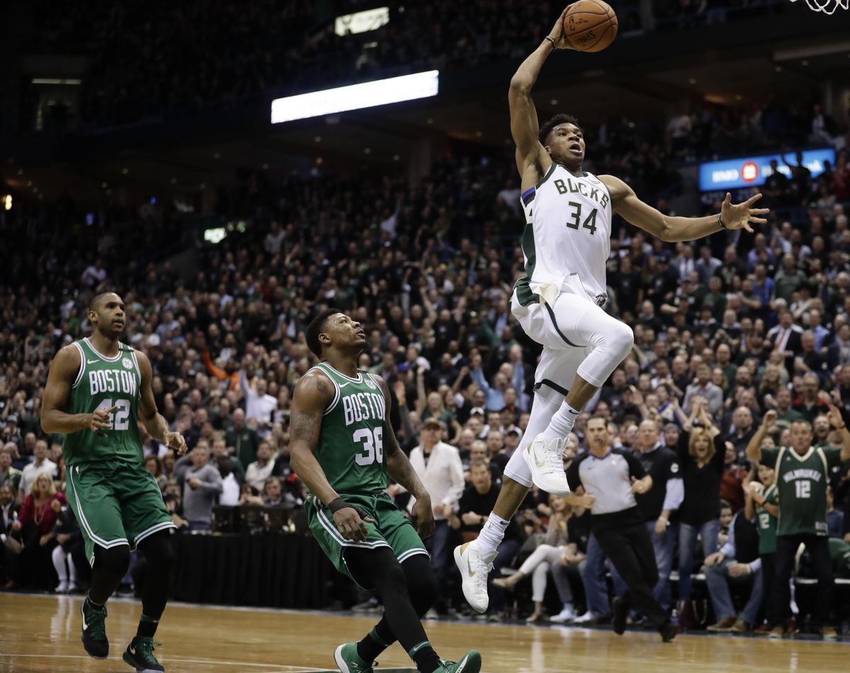 Milwaukee Bucks’ Giannis Antetokounmpo dunks during the first half of Game 6 of an NBA basketball first-round playoff series against the Boston Celtics Thursday, April 26, 2018, in Milwaukee. (Morry Gash / Associated Press)