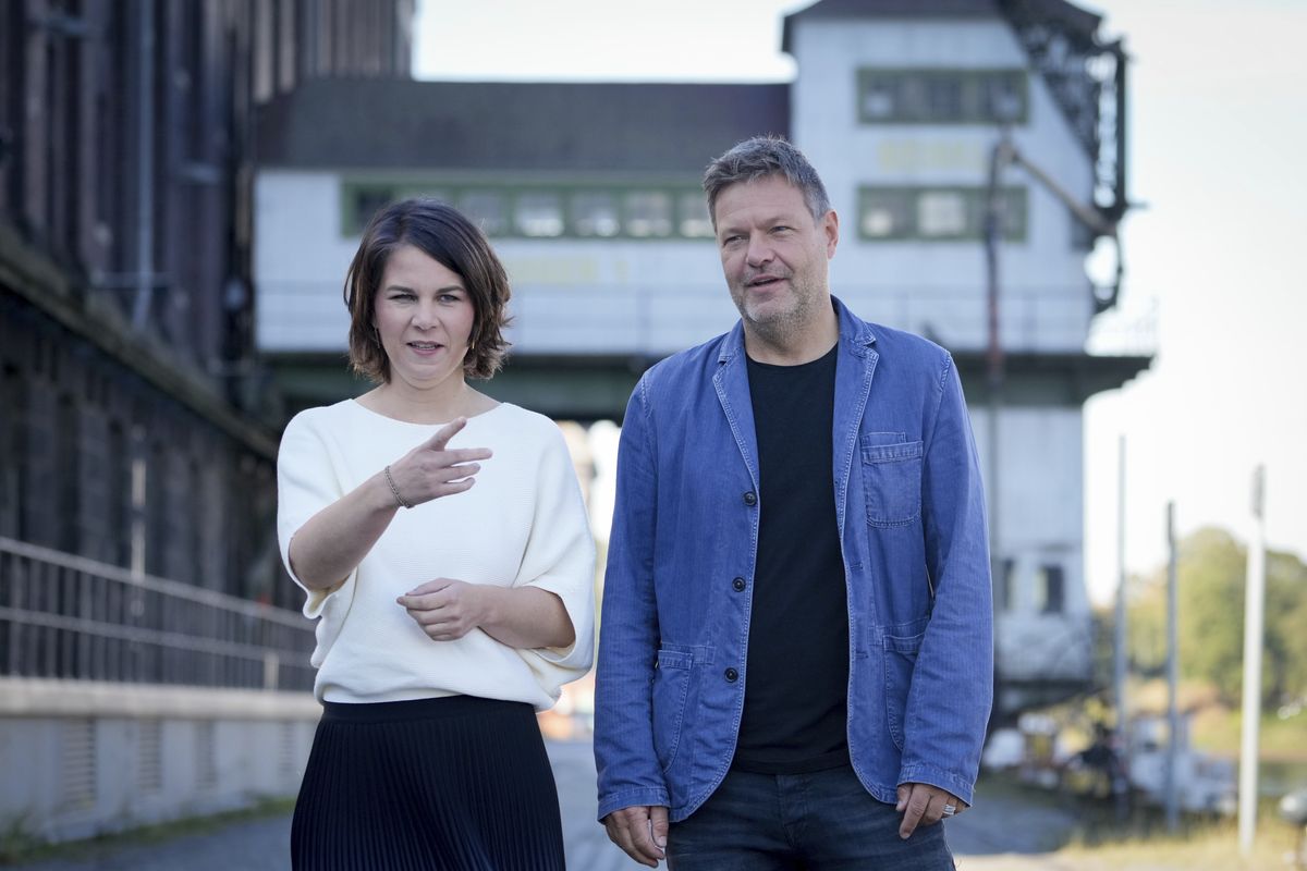 Annalena Baerbock and Robert Habeck, federal leaders of the Greens party arrive for a party convention in Berlin, Germany, Saturday, Oct. 2, 2021. Focus of the small party conference is the evaluation of the federal election and the formation of a government.  (Kay Nietfeld)