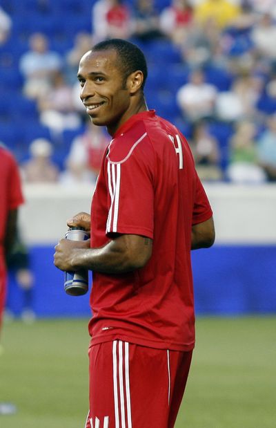 The Red Bulls' Thierry Henry scored in his debut, a 2-1 exhibition loss to Tottenham. (Associated Press)