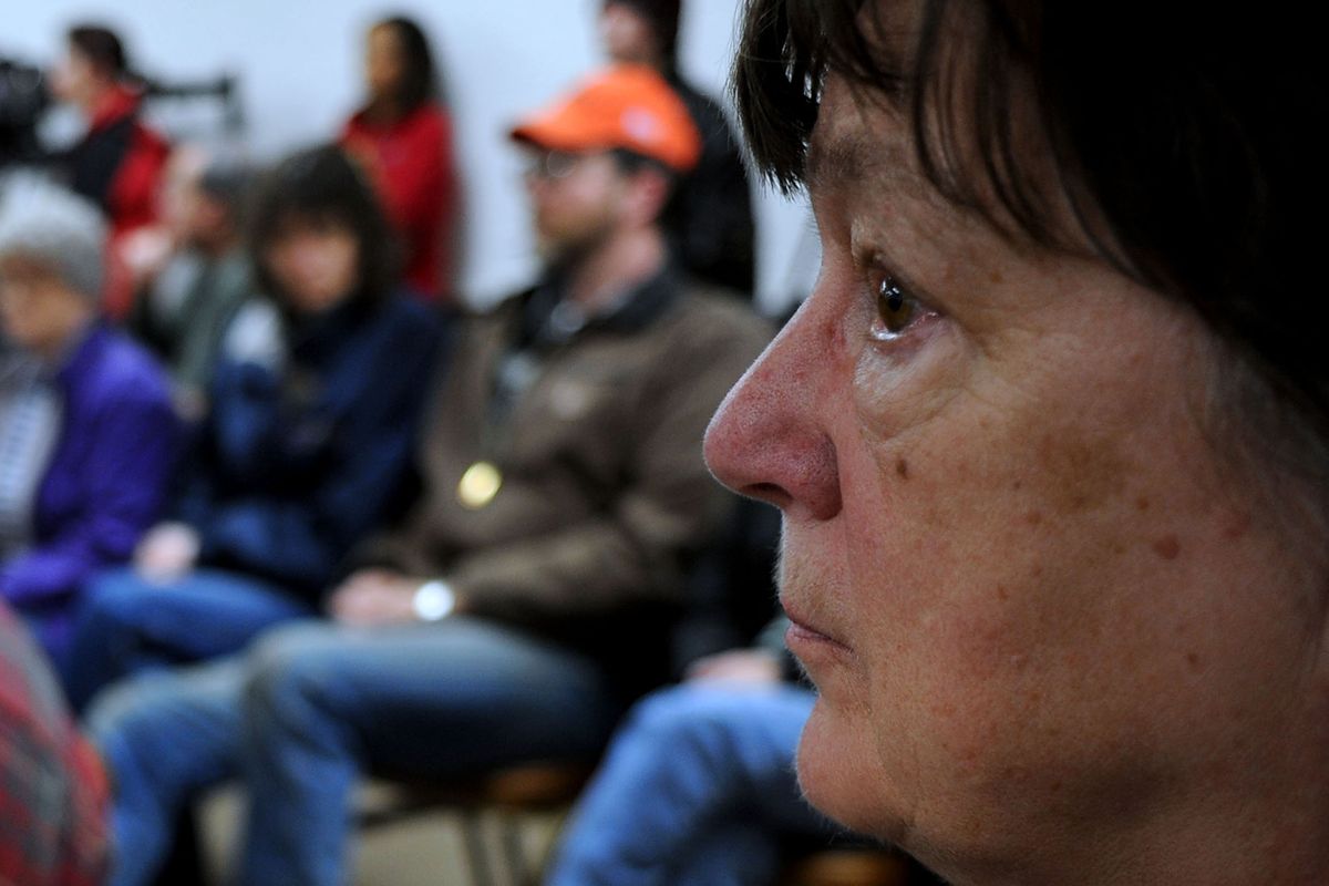Mullan resident, Nancy Johansen, listens to the press conference at Mullan City Hall in Mullan, Idaho on Saturday, April 16, 2011, after an accident at The Lucky Friday Mine on Friday. One miner is still trapped.  (Kathy Plonka / The Spokesman-Review)