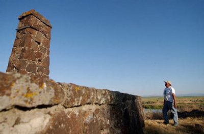 
Jim Keyes views historic structures at the Minidoka Relocation Center in Hagerman, Idaho, on Tuesday. Minidoka was one of 10 internment camps created in the interior Western states that held 120,000 Americans of Japanese descent. 
 (Associated Press / The Spokesman-Review)