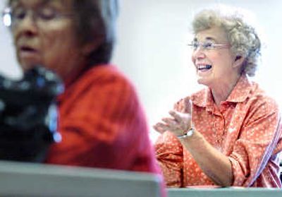 
Merrilee Foley asks a question during a class on how to simplify homes at the Corbin Community Center in Spokane.
 (The Spokesman-Review)