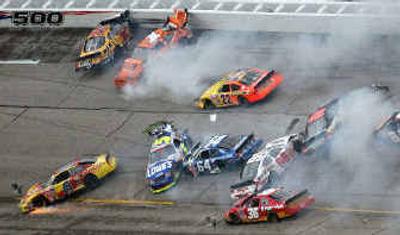 
Martin Truex Jr. (No. 8 at far right) survived this mess to go on to win the Aaron's 312 Busch Series race at Talladega.
 (Associated Press / The Spokesman-Review)