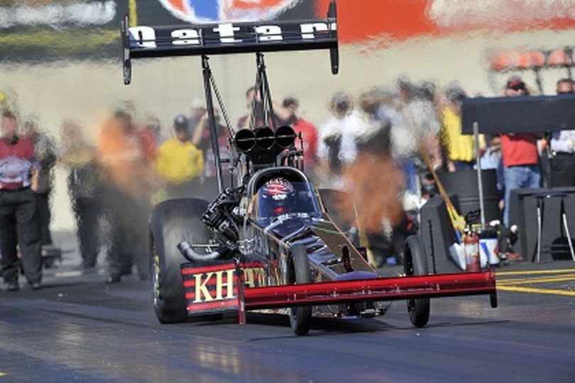 Larry Dixon powers his way to victory on the NHRA Full Throttle Drag Racing Series. The win was Dixon's 12th of the 2010 season and comes as the series stopped in Reading, PA. (Photo courtesy of NHRA)