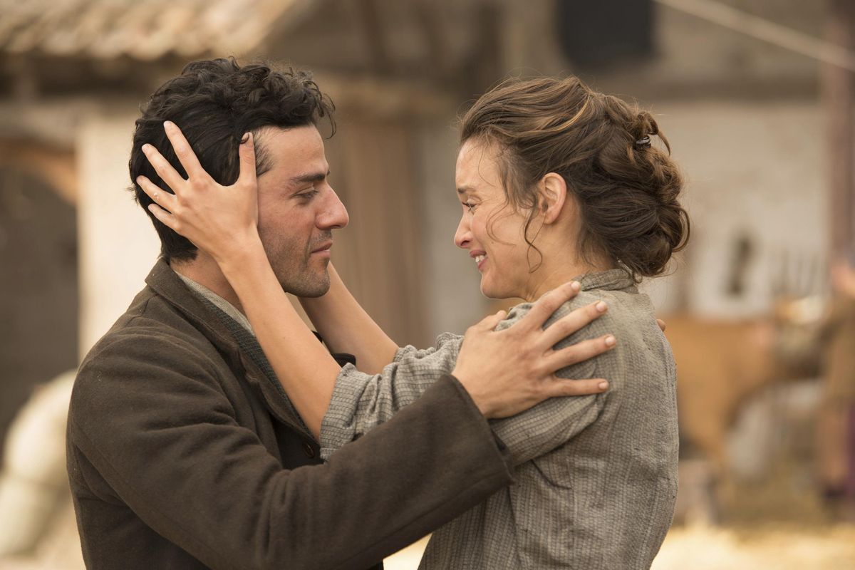 Oscar Isaac, left, and Charlotte Le Bon in a scene from "The Promise." (Jose Haro / AP)