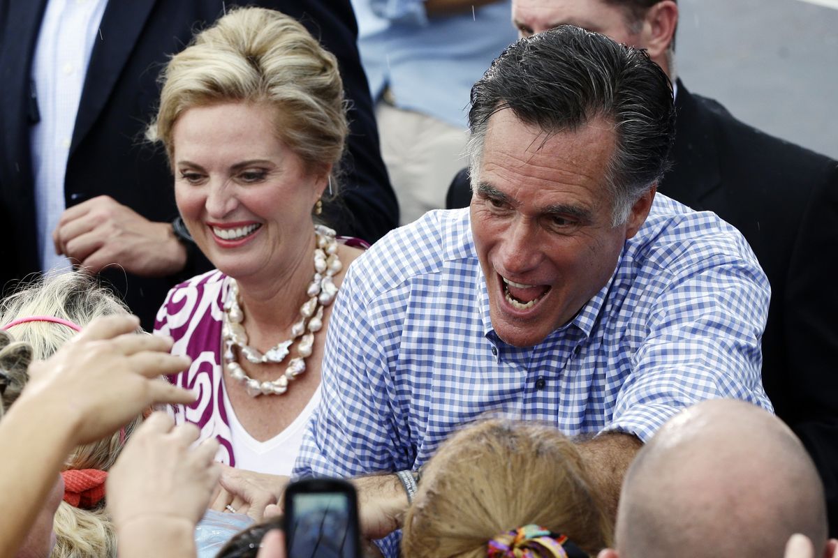 Republican presidential candidate and former Massachusetts Gov. Mitt Romney and wife Ann campaign at Tradition Town Square in Port St. Lucie, Fla., Sunday, Oct. 7, 2012. (Charles Dharapak / Associated Press)