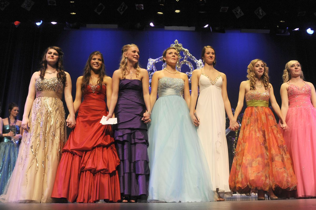 After being selected as Lilac princesses, from left, Hailey Hyde, Emily Staker, Brett Rountree, Katie Heitkemper, Devyn Russell, Michelle Tatko and Savannah Sundseth wait for the announcement of the Lilac Queen on Sunday at the Bing Crosby Theater. (Jesse Tinsley)