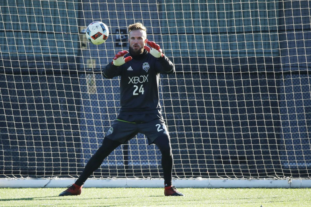 In this Dec. 7, 2016 photo, Seattle Sounders goalkeeper Stefan Frei makes a stop as he takes part in training in Tukwila, Wash. The Sounders are scheduled to face Toronto FC in the MLS Cup on Saturday, Dec. 10, 2016 in Toronto. (Ted S. Warren / Associated Press)