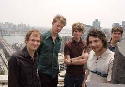 
Folk rock band Wilco poses in the stairwell at 1 Center Street in New York City earlier this month.
 (Associated Press / The Spokesman-Review)