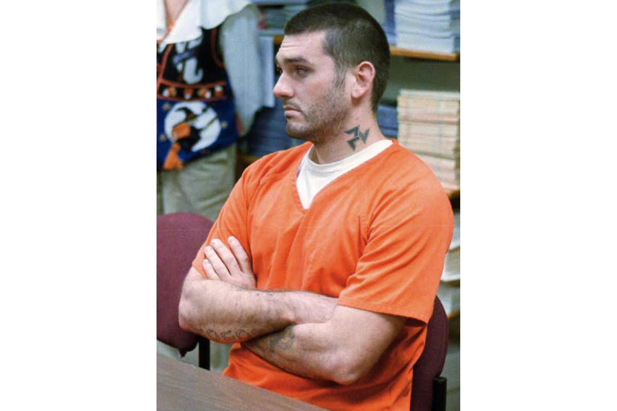 FILE - In this Oct. 31 1997 file photo Danny Lee waits for his arraignment hearing for murder in the Pope County Detention Center in Russellville, Ark. A federal judge in Indiana on Friday, July, 10, 2020, halted the first federal execution planned in 17 years scheduled three days from now over COVID-19 concerns. Daniel Lee had been scheduled to die by lethal injection. Lee, 47, of Yukon, Okla., was convicted of the 1996 killings of gun dealer William Mueller, his wife, Nancy, and her 8-year-old daughter, Sarah Powell.  (Dan Pierce)