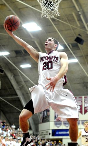 Whitworth guard Colton McCargar (20) lays in the ball over Emory on during the 2013 NCAA Div. III Tournament's second round Saturday, March 9, 2013, at Whitworth's fieldhouse in Spokane, Wash. Whitworth won the game 86-67. (Tyler Tjomsland / The Spokesman-Review)