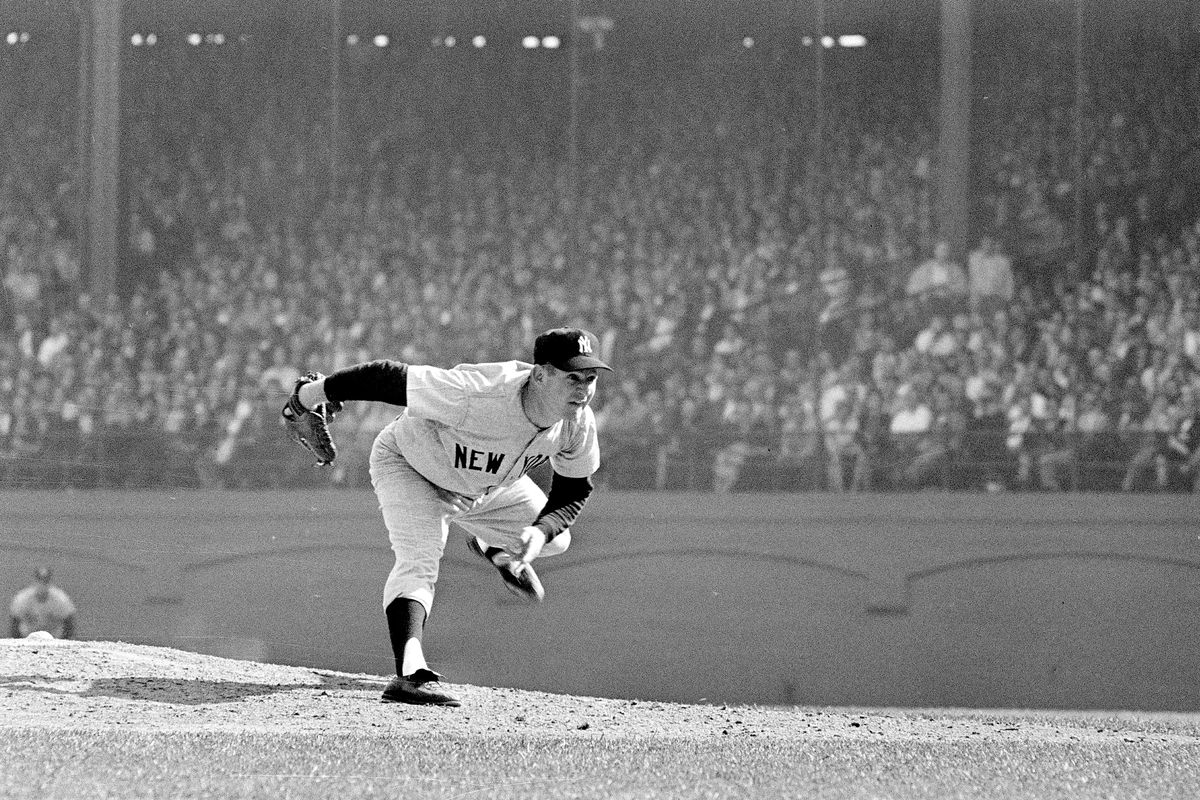 New York Yankees pitcher Whitey Ford throws during the 6th game of the World Series against the Pittsburgh Pirates on Oct. 12, 1960, in Pittsburgh. A family member tells The Associated Press on Friday, Oct. 9, 2020 that Ford died at his Long Island home Thursday night.  (STF)