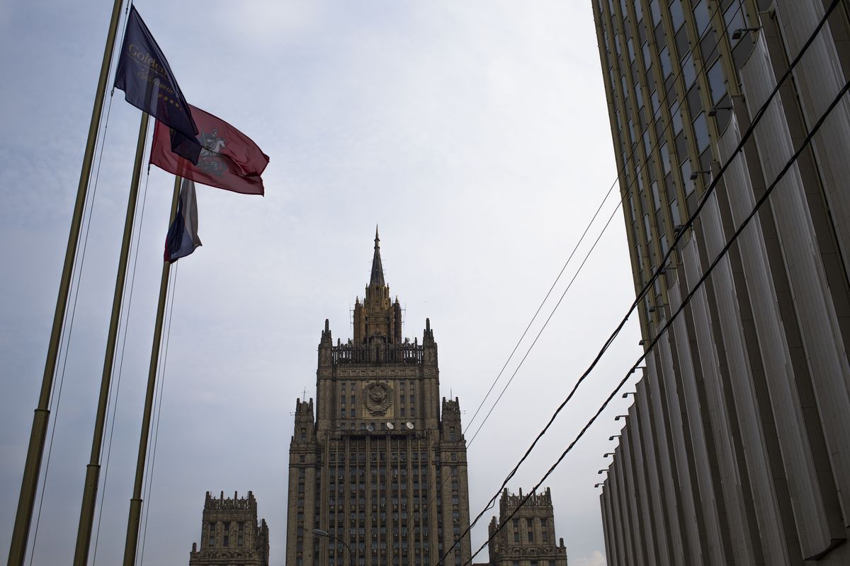 The Russian Foreign Ministry headquarters seen at the background in Moscow on Thursday, Oct. 4, 2012.  US prosecutors allege that naturalized U.S. citizen  Alexander Fishenko and six others "engaged in a surreptitious and systematic conspiracy" to obtain highly regulated technology from U.S. makers and sold them to Russian authorities. Fishenko and six others charged in the alleged scheme are expected to appear Thursday morning in U.S. Houston federal court. (Alexander Zemlianichenko / Associated Press)