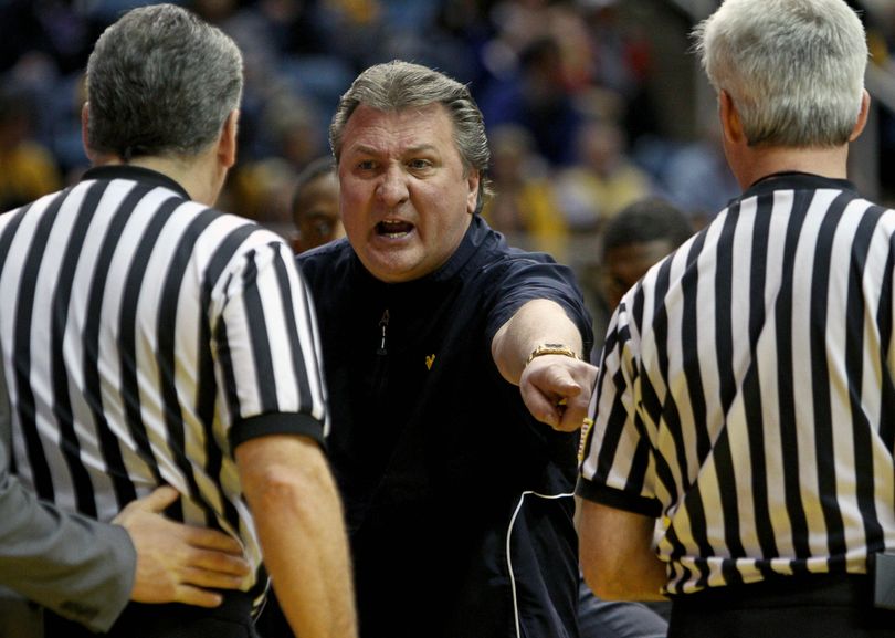 West Virginia coach Bob Huggins has a revamped roster looking to avenge last season’s NCAA loss. (Associated Press)