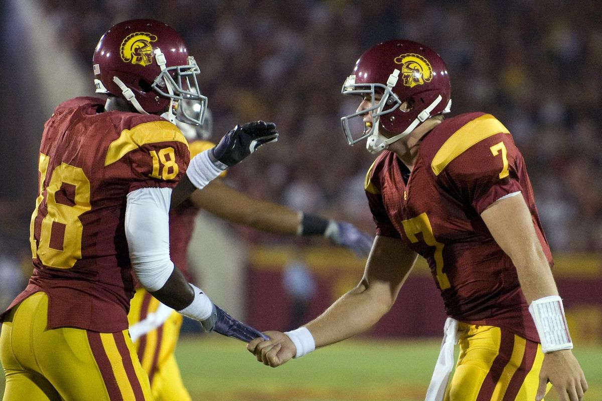ORG XMIT: LAC102 Southern California quarterback Matt Barkley, right, celebrates Southern California wide receiver Damian Williams touchdown during  during the first half against Washington State in an NCAA college football game in Los Angeles, Saturday, Sept. 26, 2009.  (AP Photo/Chris Carlson) (Chris Carlson / The Spokesman-Review)