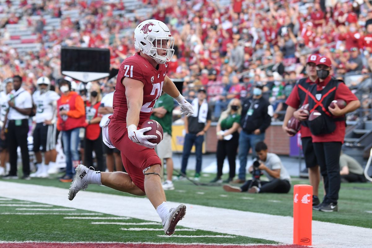 Washington State Cougars running back Max Borghi (21) runs the ball in for a touchdown against the Portland State Vikings during the second half of a college football game on Saturday, Sep 11, 2021, at Martin Stadium in Pullman, Wash. WSU won the game 44-24.  (Tyler Tjomsland/The Spokesman-Review)