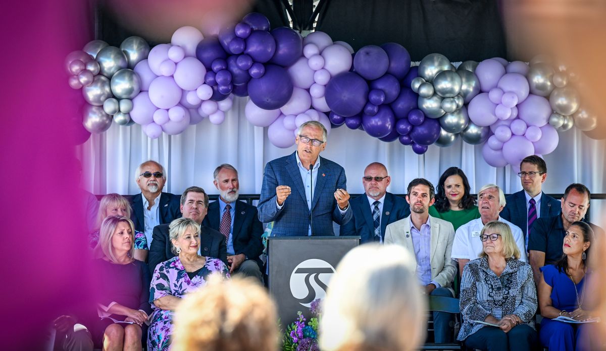 Gov. Jay Inslee addresses the crowd gathered for the City Line ribbon-cutting ceremony Tuesday at the corner of Cincinnati Street and Desmet Avenue on the Gonzaga University campus.  (DAN PELLE/THE SPOKESMAN-REVIEW)