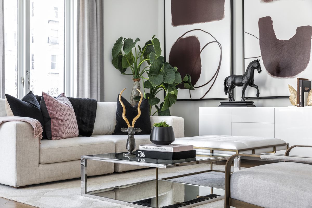 A “pop of pink” adds an unexpected contrast element in this living space.  (HO)
