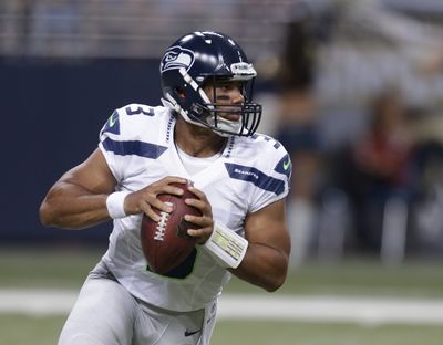 Seattle Seahawks quarterback Russell Wilson has struggled on third-down plays. (Associated Press)