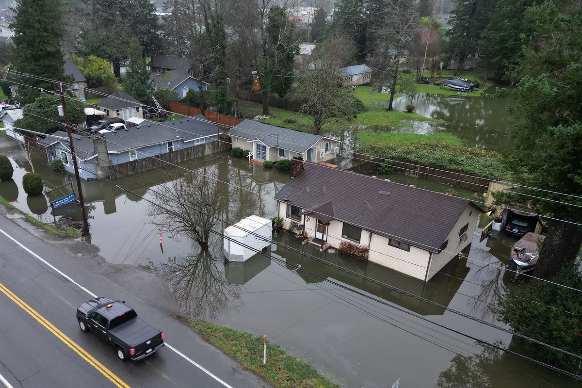 Flooded homes in North Bend, Washington, on Thursday, Dec. 11, 2025. (Ken Lambert/The Seattle Times)