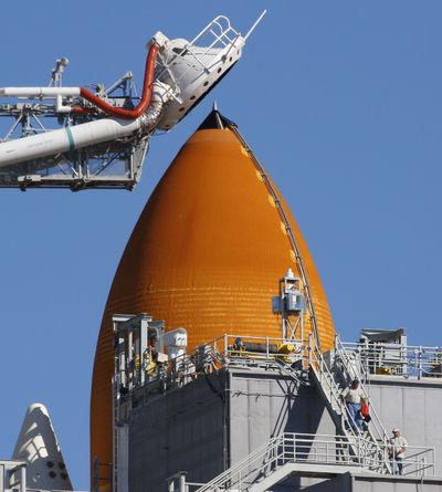 Space shuttle Atlantis readied for today’s launch  at the Kennedy Space Center in Cape Canaveral, Fla. (Associated Press)