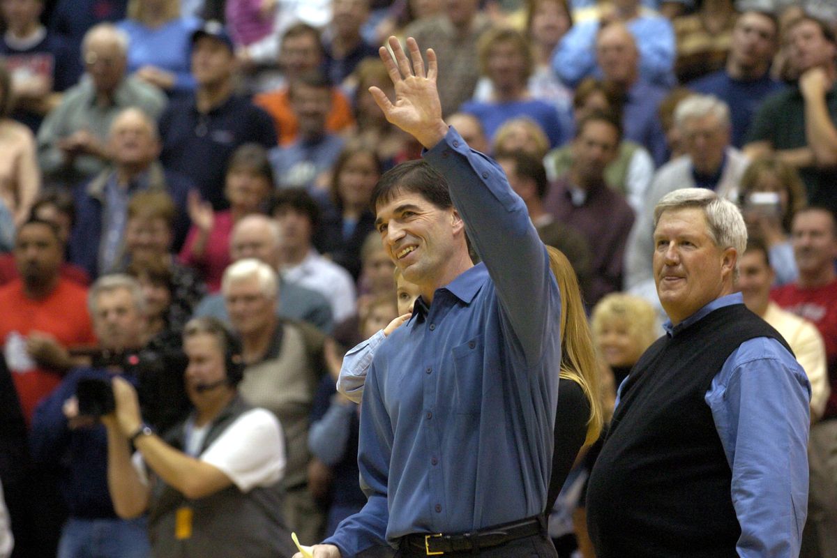 John Stockton turns and waves to the crowd at The Kennel after his jersey was retired in 2004.  (The Spokesman-Review)