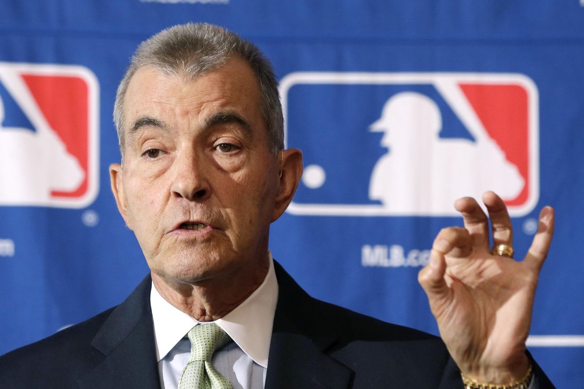 FILE - In this Aug. 15, 2013, file photo, Atlanta Braves president John Schuerholz speaks during a news conference following MLB meetings at the Otesaga Hotel in Cooperstown, N.Y. (Mike Groll / Associated Press)