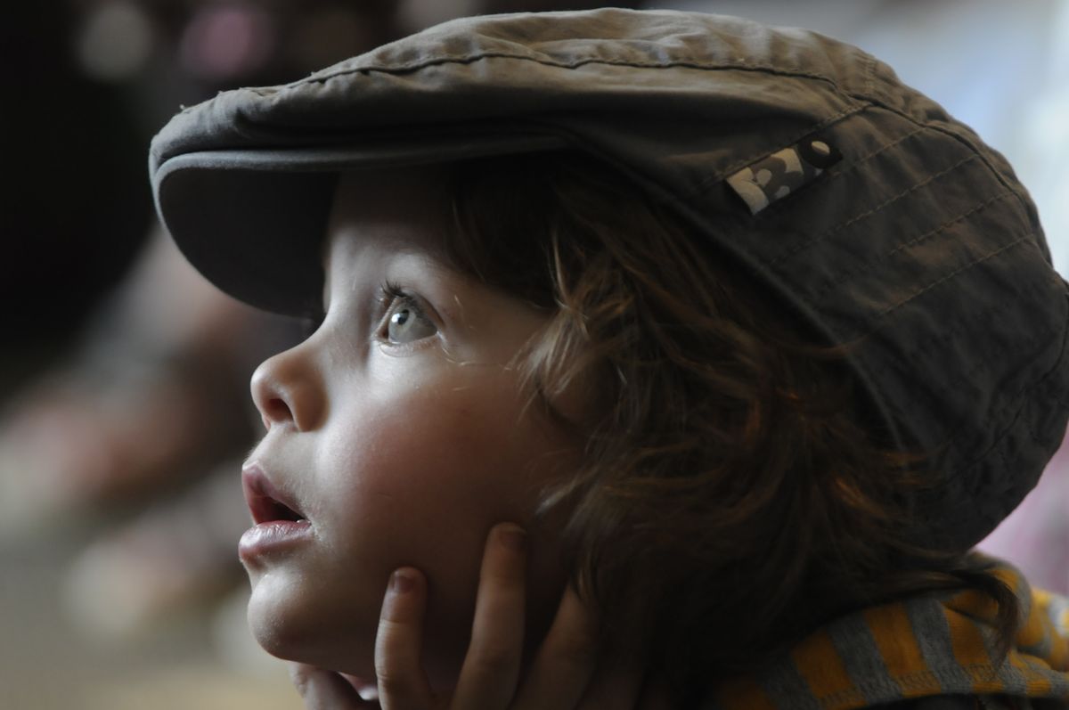 Judah Lauri, 3, listens to a story from a librarian at the Coeur d’Alene Library on Tuesday.  (Jesse Tinsley / The Spokesman-Review)