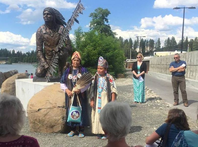 Here's proof that I wasn't lollygagging today. I'm in the right corner (sunglasses), standing next to emcee Jennifer Drake. Kathy Plonka/SR photog is in the lower right corner photographing the event. In the foreground, Jeanie Louis and her granddaughter, Northstar Garvais Lawrence, 10, discuss their famous ancestor, Chief Morris Antelope. (Eden Irgens' Facebook photo)