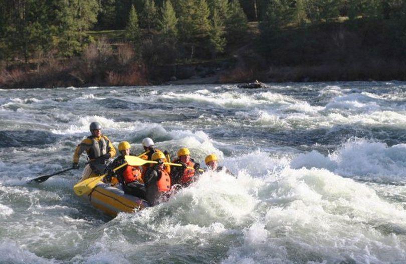 Peak 7 Adventures based in Spokane specializes in taking underprivileged youth on outdoor adventures, such as this teen trip through rapids on the Spokane River. (Peak 7 Adventures)
