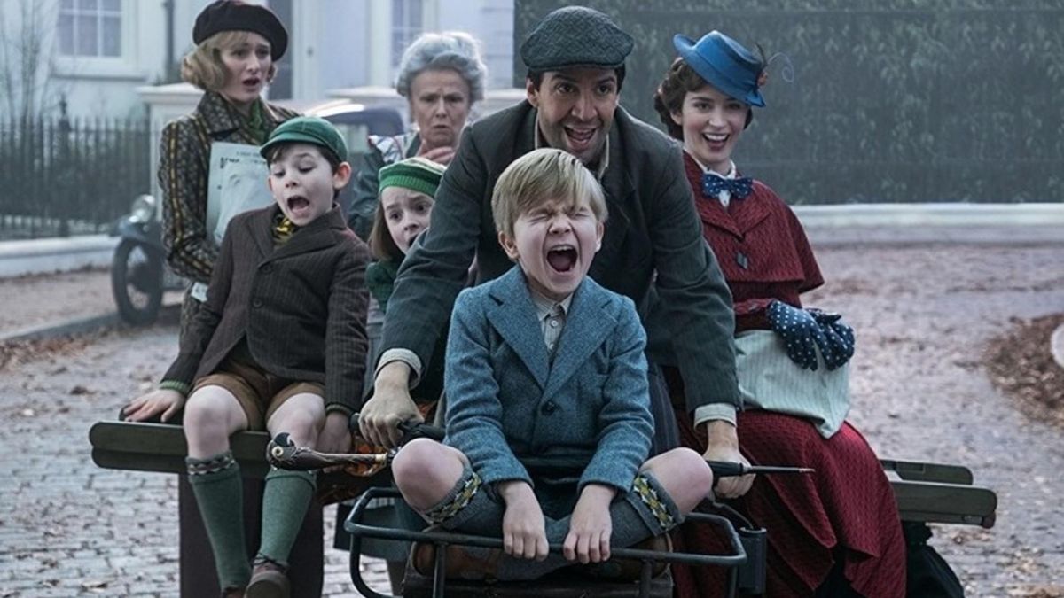 Emily Mortimer, Julie Walters, Lin-Manuel Miranda, and Emily Blunt with the kids in "Mary Poppins Returns." (Walt Disney Studios)