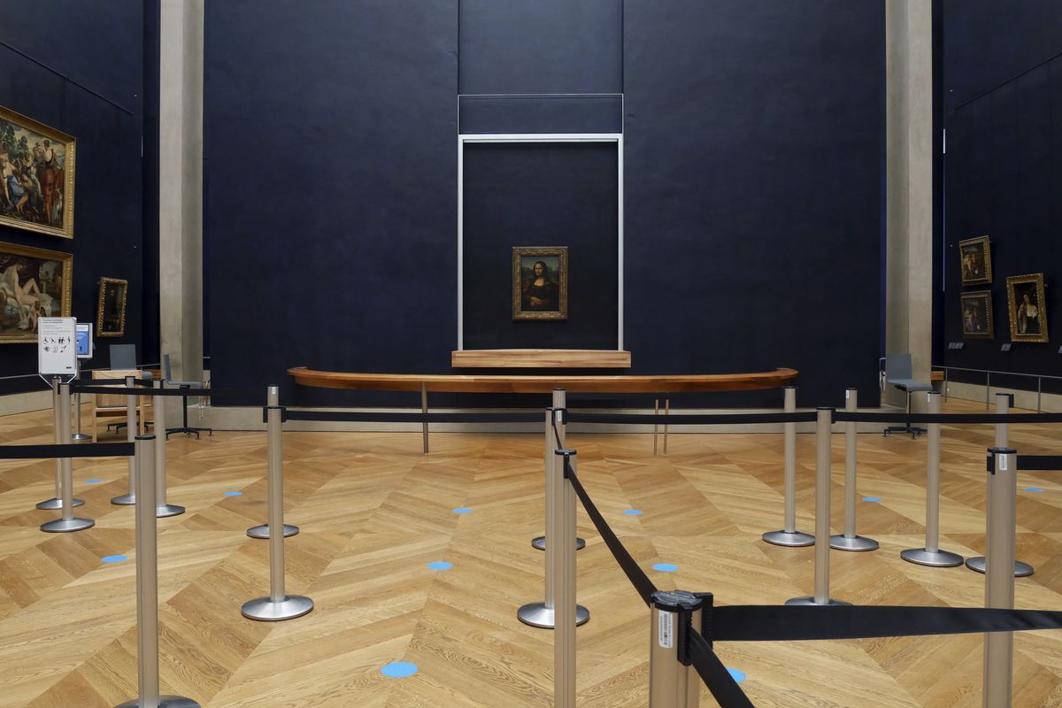 The 518-year-old Mona Lisa will have seen many things in her life on display, but rarely this: Almost four months with no visitors. She stares out in Paris’ Louvre, across bulletproof glass into the now-silent emptiness of the shuttered Salle des Etats.  (Thibault Camus)
