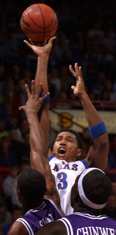 
Kansas forward Wayne Simien often draws double- and triple-team coverage. 
 (Associated Press / The Spokesman-Review)