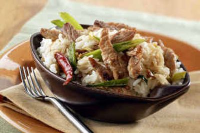 
Stir-fried Pork in Garlic Sauce can be made in about 20 minutes with this recipe. The dish combines the fresh meat with simple items – soy sauce, garlic and onion. 
 (Associated Press / The Spokesman-Review)