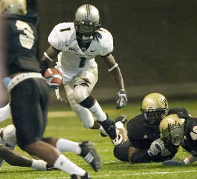 
Hawaii's Ryan Grice-Mullen  avoids UI defenders. Associated Press
 (Associated Press / The Spokesman-Review)