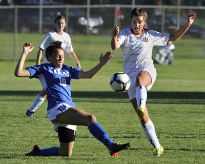 Mead's Kara Mabury (19) and Lewis and Clark's Sarah Silha (7) battle for control of the ball near mid-field, October 15, 2010 at Hart Field in Spokane, Wash. (Dan Pelle / The Spokesman-Review)