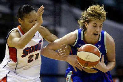 
New York's Elena Baranova, right, loses the ball to Charlotte's Allison Feaster.
 (Associated Press / The Spokesman-Review)