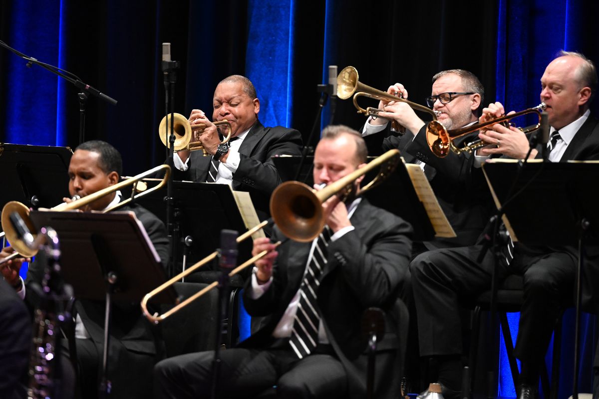 Trumpeter Wynton Marsalis, upper left, winds up a solo with the Jazz at Lincoln Center Orchestra on Saturday at the Fox Theater. Around him are trumpters Ryan Kisor, second from upper right, trumpeter Kenny Rampton, upper right, and trombonists Vincent Gardner, lower left, and Elliot Mason.  (Jesse Tinsley/THE SPOKESMAN-REVIEW)
