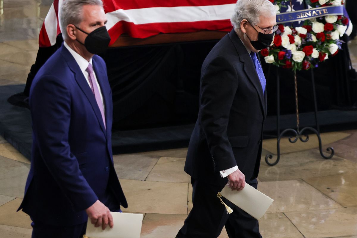 House Minority Leader Kevin McCarthy of Calif. and Senate Minority Leader Mitch McConnell of Ky., right, pay their respects to former Senate Majority Leader Harry Reid, D-Nev., during a memorial service in the Rotunda of the U.S. Capitol as Reid lies in state, Wednesday, Jan. 12, 2022, in Washington. (Evelyn Hockstein)