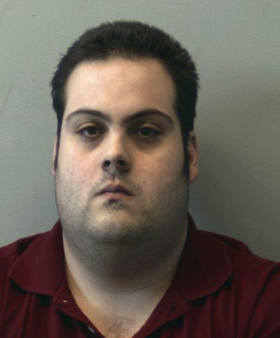 This booking photo released Thursday, March 1, 2018, by the Beverly Police Department shows Daniel Frisiello, of Beverly, Mass. Frisiello, of Beverly, is accused of mailing five envelopes earlier this month with threatening messages and a white substance, which turned out to be nonhazardous. (Associated Press)
